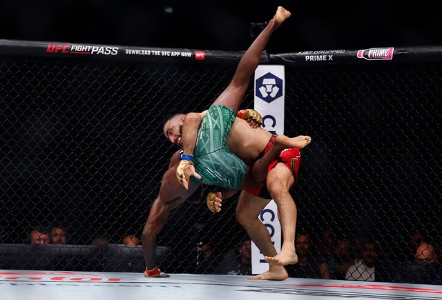 Belal Muhammad throws Leon Edwards. PHOTO: REUTERS